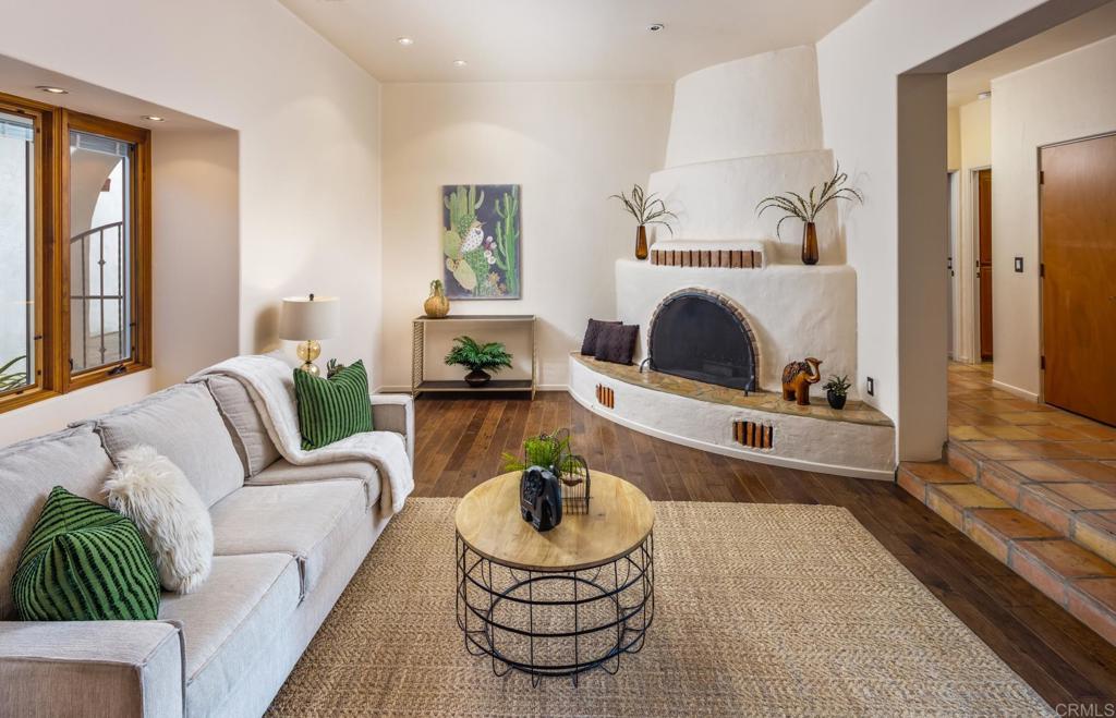 2202 Mountain Vista Drive Encinitas, CA 92024 - Photo 8 of 28 a living room with furniture and a fireplace