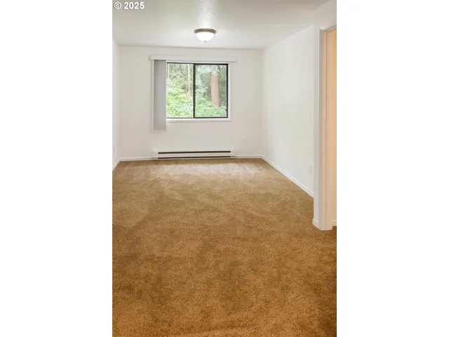 a view of a room with windows