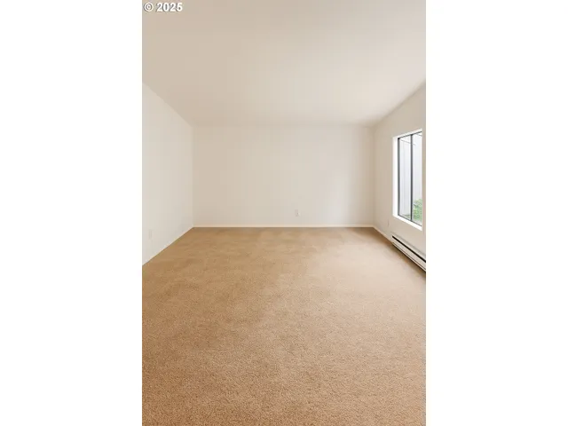 a picture of a room with a window