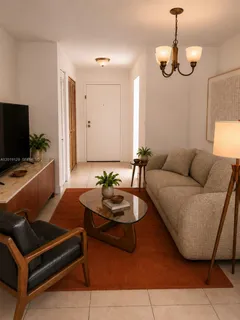a kitchen with a cabinets and white appliances