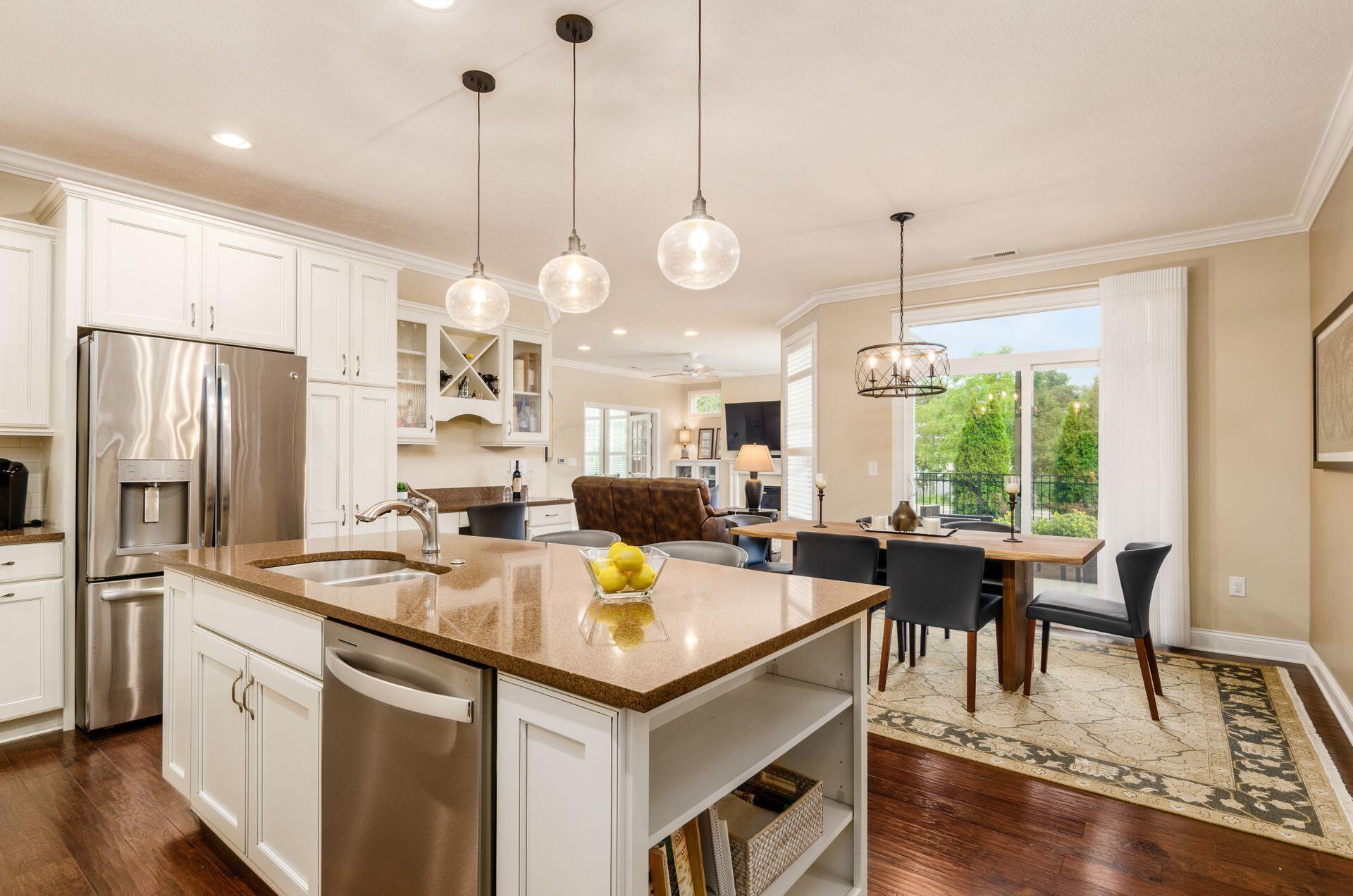 6960 Morningstar Loop Westerville, OH 43082 - Photo 22 of 47 View from kitchen into the open dining room