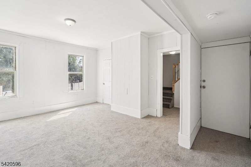 904 2nd Avenue, Unit 2 Elizabeth, NJ 07201 - Photo 15 of 19 an empty room with windows and closet