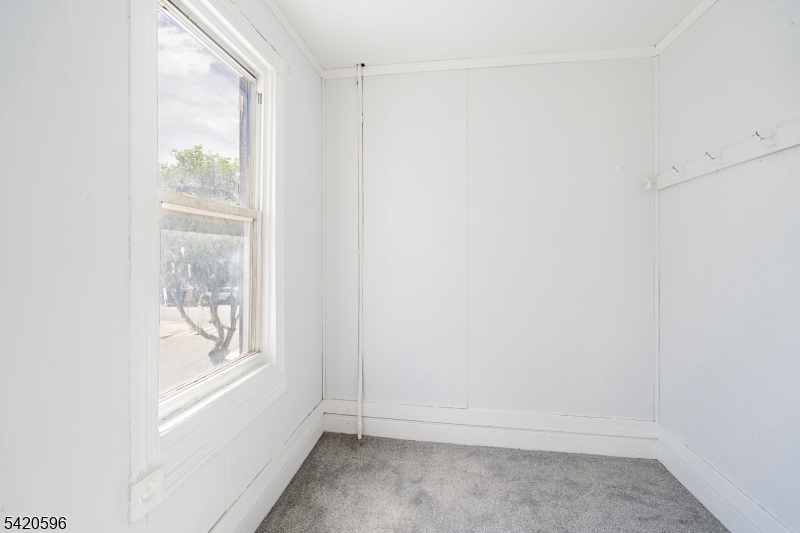 904 2nd Avenue, Unit 2 Elizabeth, NJ 07201 - Photo 10 of 19 a view of an empty room with a window