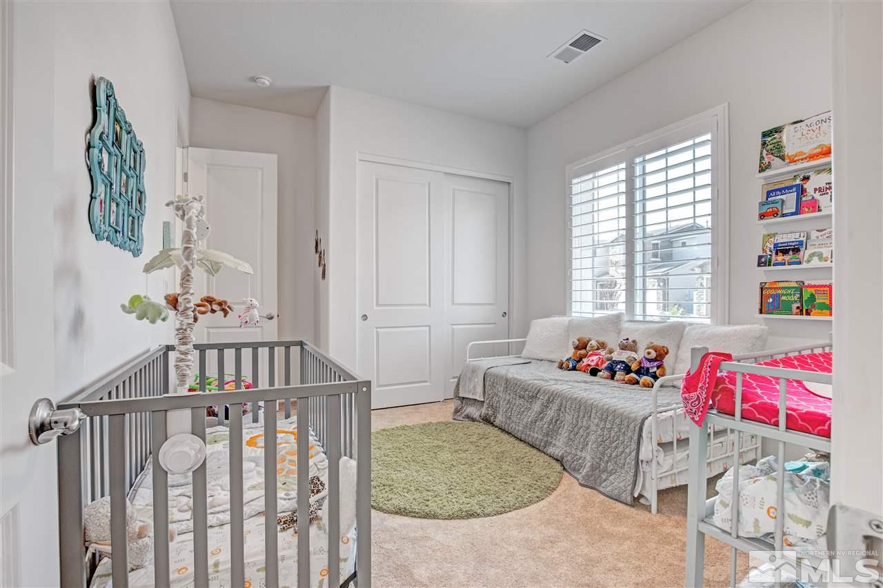 3175 Show Jumper Lane Reno, NV 89521 - Photo 23 of 40 a bedroom with furniture and a window