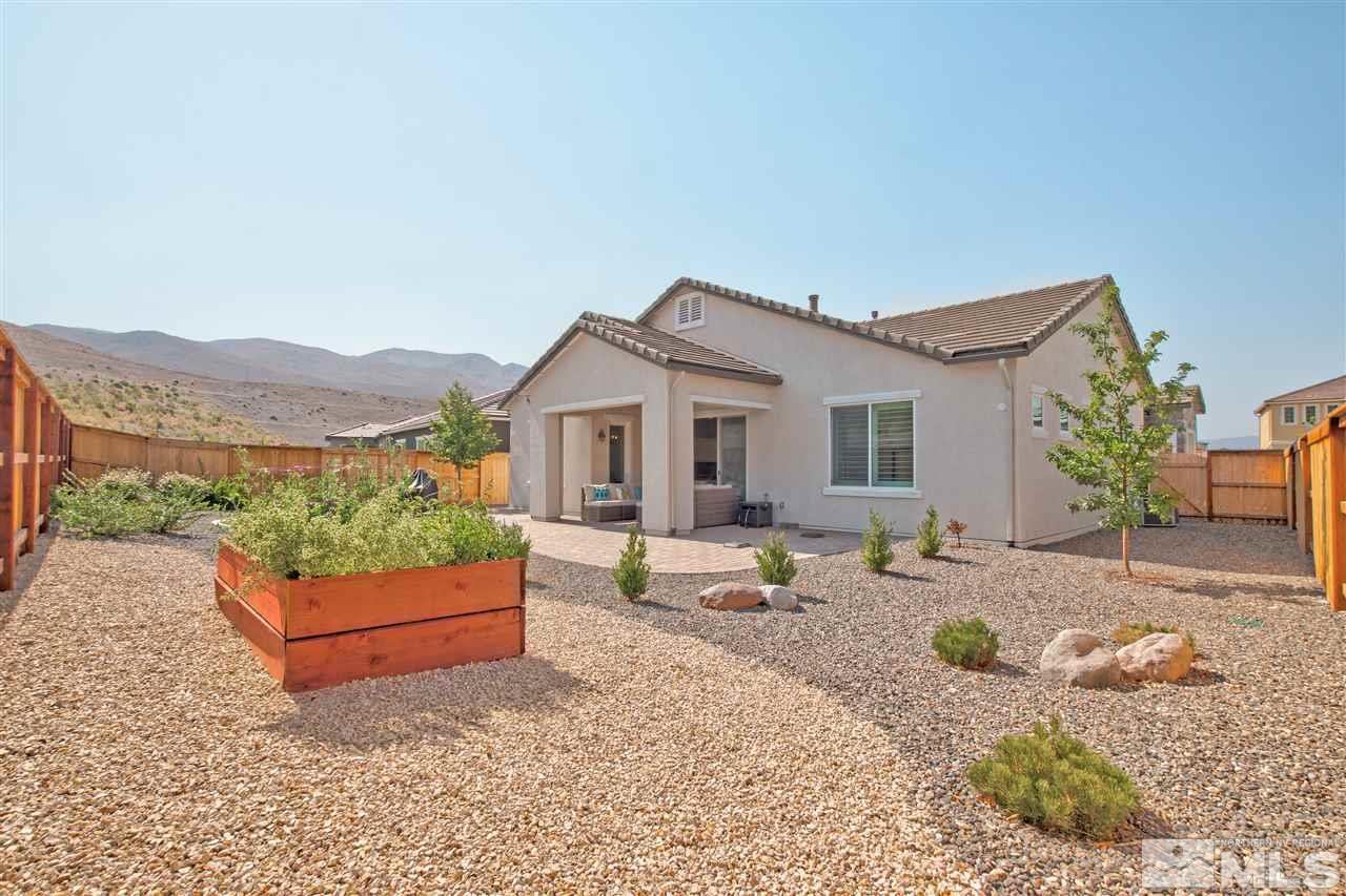 3175 Show Jumper Lane Reno, NV 89521 - Photo 28 of 40 a view of a house with backyard and sitting area