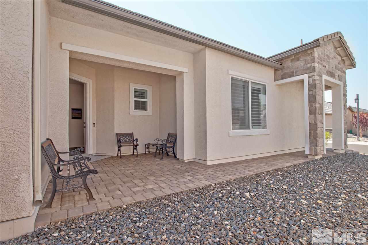3175 Show Jumper Lane Reno, NV 89521 - Photo 3 of 40 a backyard of a house with outdoor seating