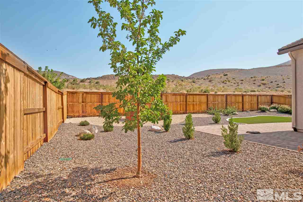 3175 Show Jumper Lane Reno, NV 89521 - Photo 31 of 40 a view of a street with a house in the background