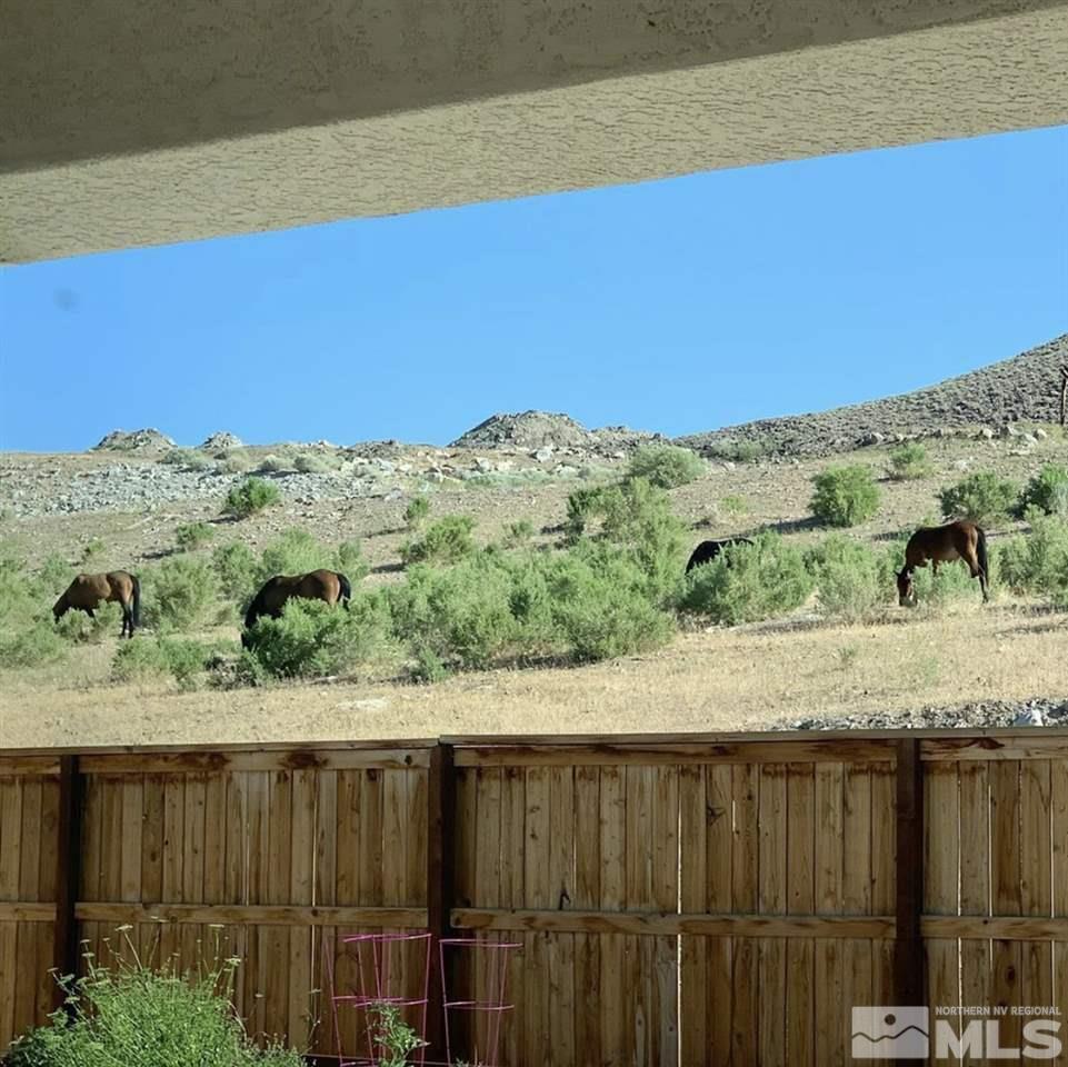 3175 Show Jumper Lane Reno, NV 89521 - Photo 32 of 40 a view of a lake with a mountain