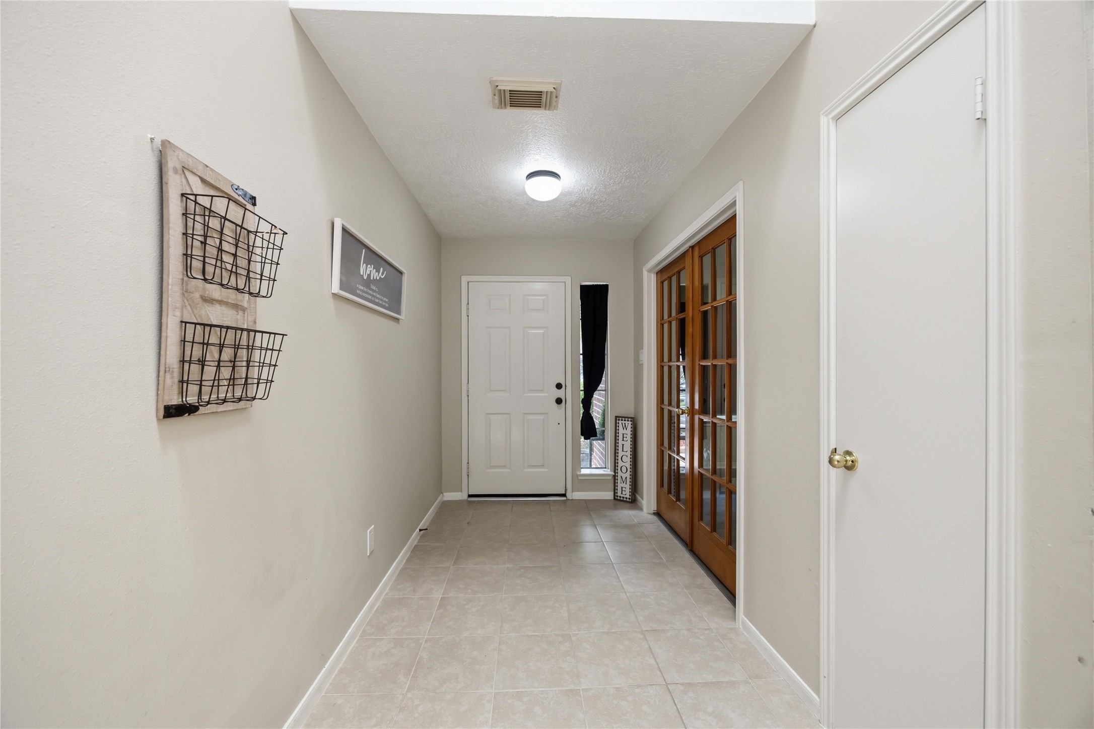 3226 Keygate Drive Spring, TX 77388 - Photo 3 of 34 Long Entry Hallway-Living Room View