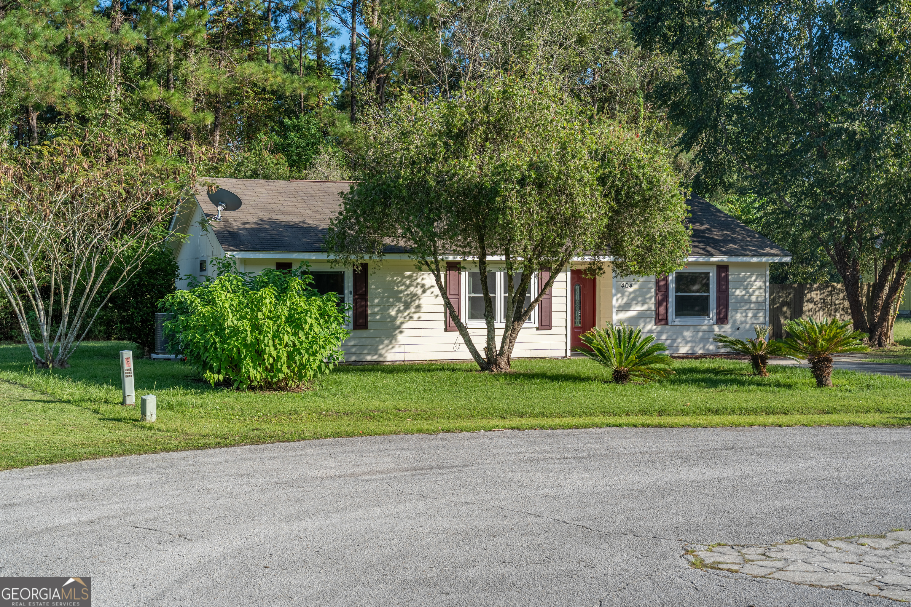404 Potomac Court St. Marys, GA 31558 - Photo 2 of 30 a house view with a garden space