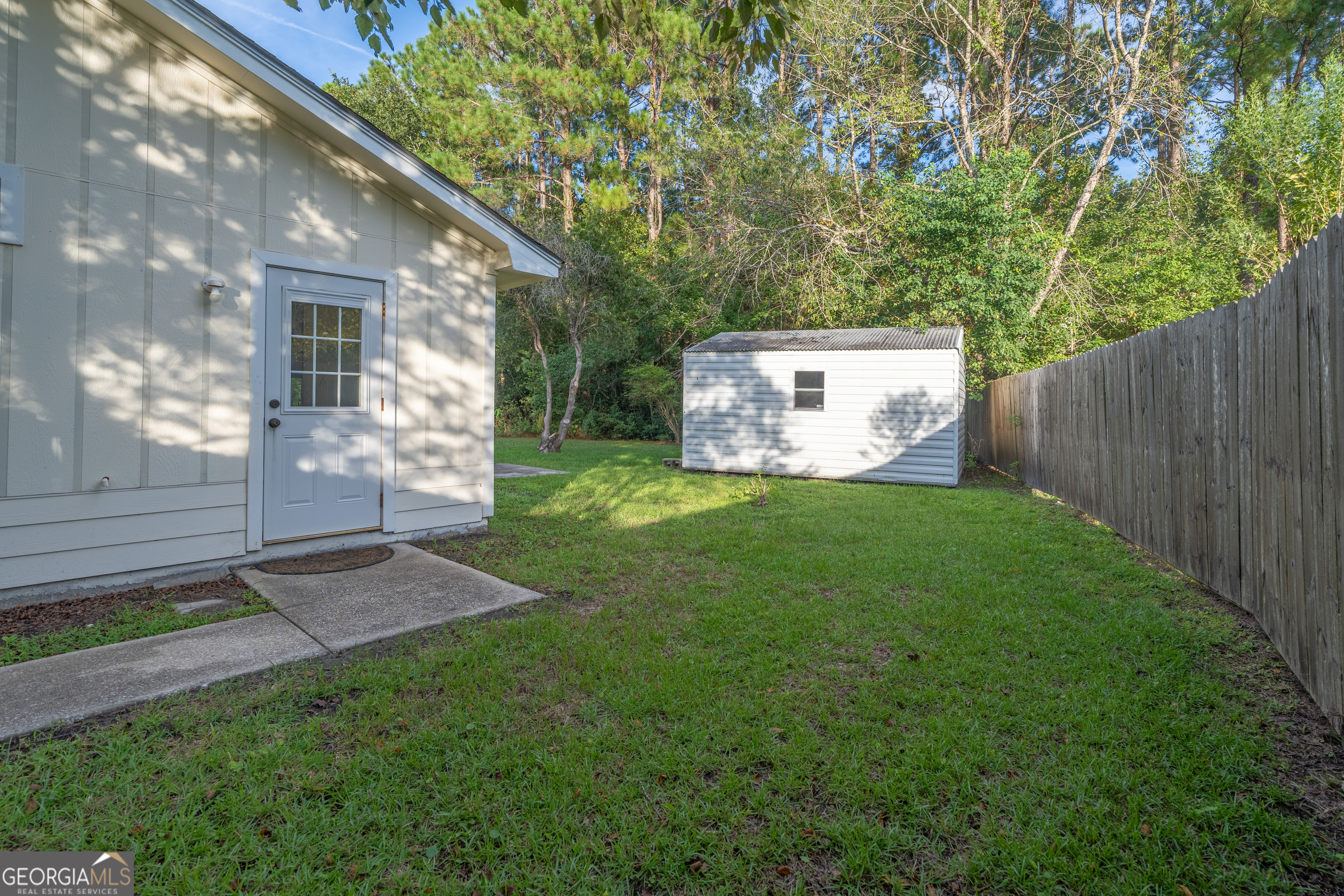 404 Potomac Court St. Marys, GA 31558 - Photo 28 of 30 a view of a back yard of the house