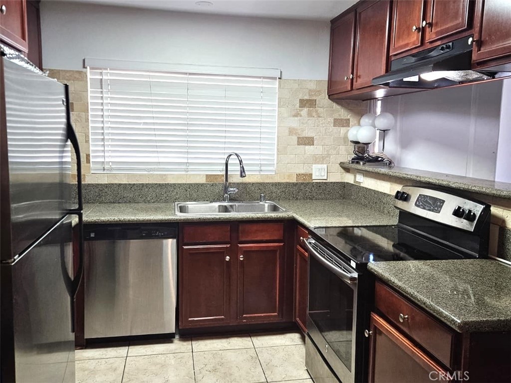 12805-18 Mapleview Street Lakeside, CA 92040 - Photo 6 of 28 a kitchen with a sink and a stove