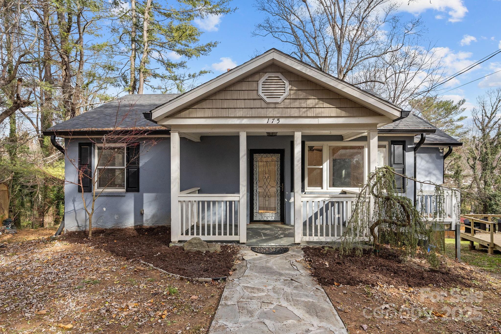 175 Chatham Road Asheville, NC 28804 - Photo 2 of 48 a front view of a house with a porch