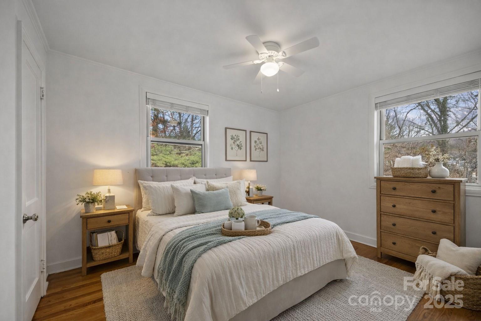 175 Chatham Road Asheville, NC 28804 - Photo 27 of 48 a bedroom with a bed and a window