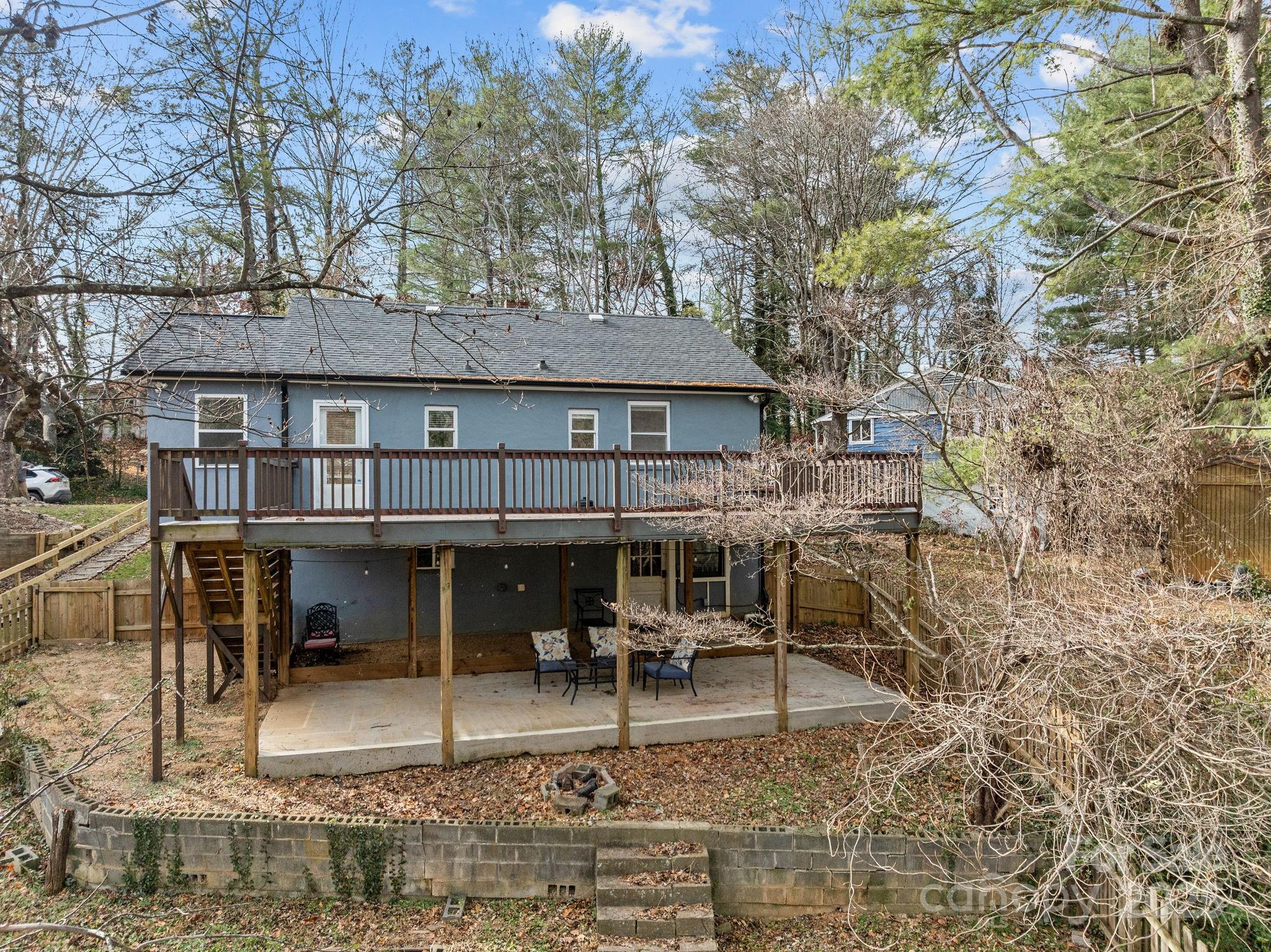 175 Chatham Road Asheville, NC 28804 - Photo 43 of 48 a view of a house with backyard porch and sitting area