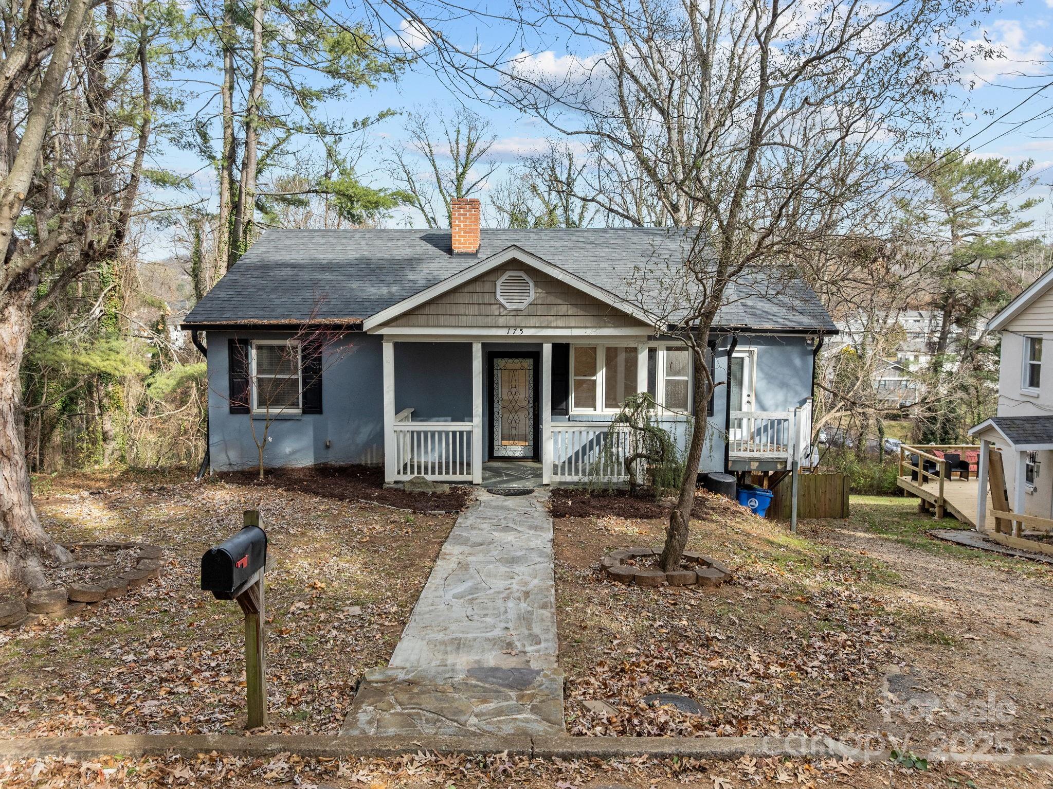 175 Chatham Road Asheville, NC 28804 - Photo 46 of 48 a front view of a house with garden