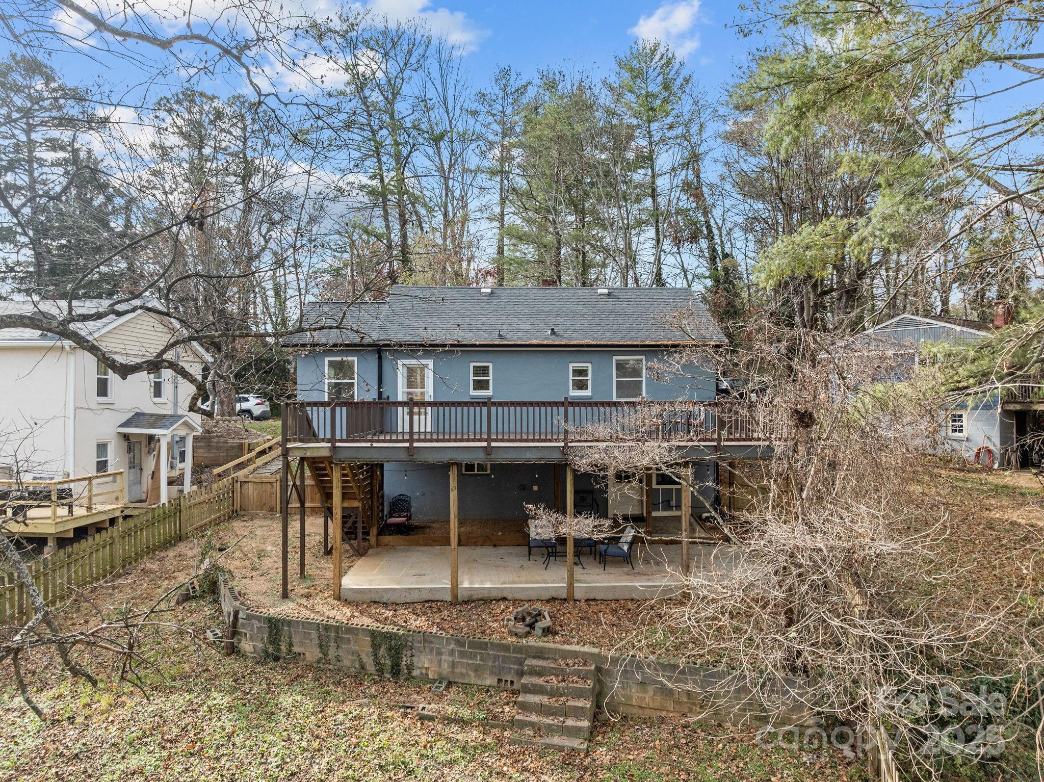 175 Chatham Road Asheville, NC 28804 - Photo 5 of 48 a view of a house with backyard porch and sitting area