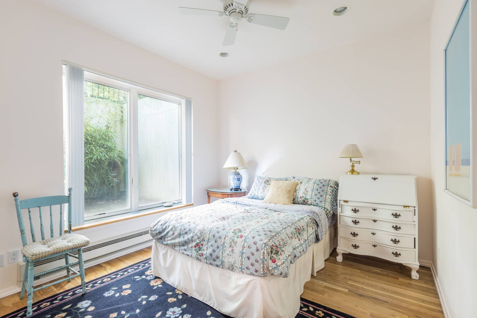 114 Neck Path East Hampton, NY 11937 - Photo 14 of 20 a bedroom with a bed and wooden floor