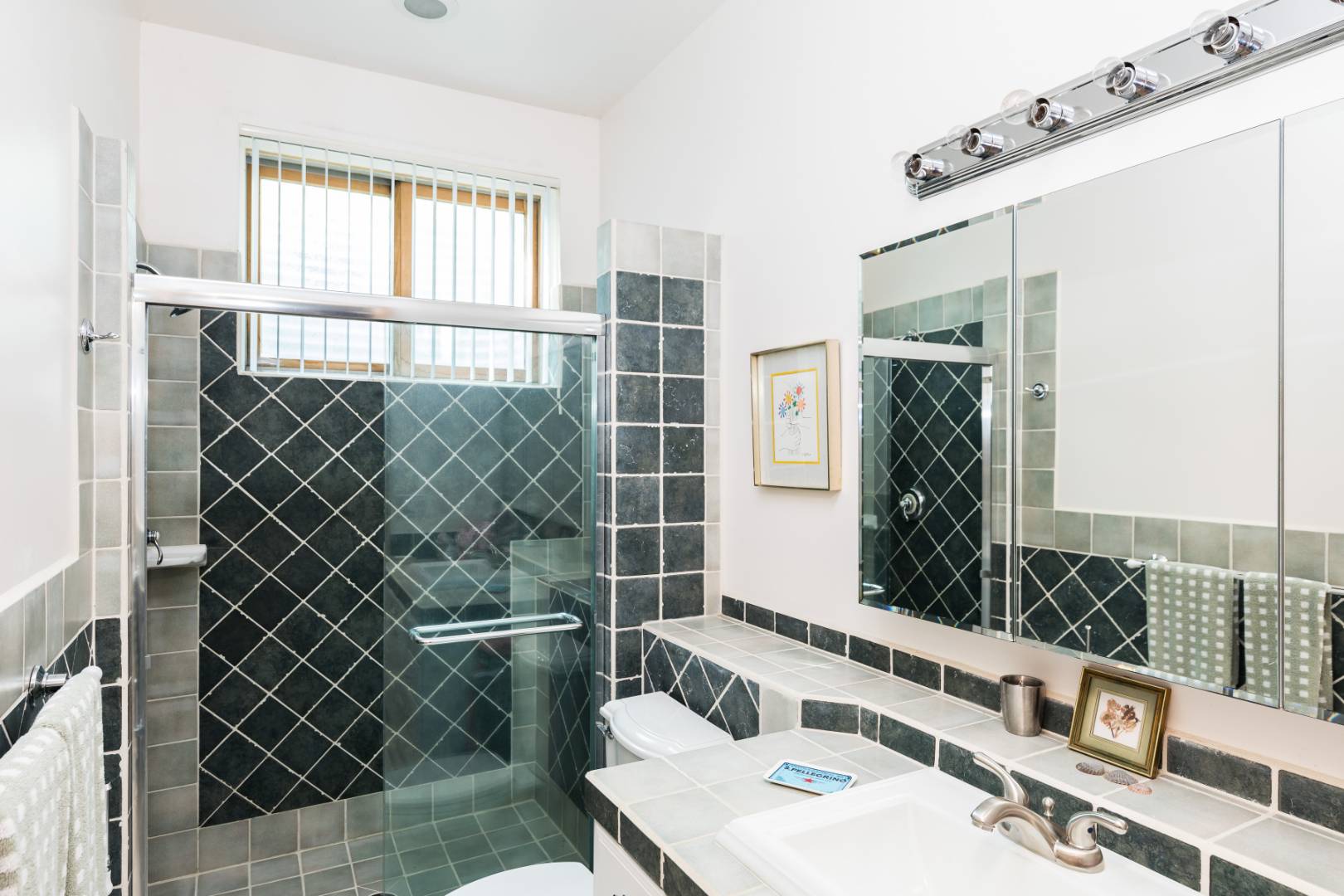 114 Neck Path East Hampton, NY 11937 - Photo 15 of 20 a bathroom with a sink and a mirror