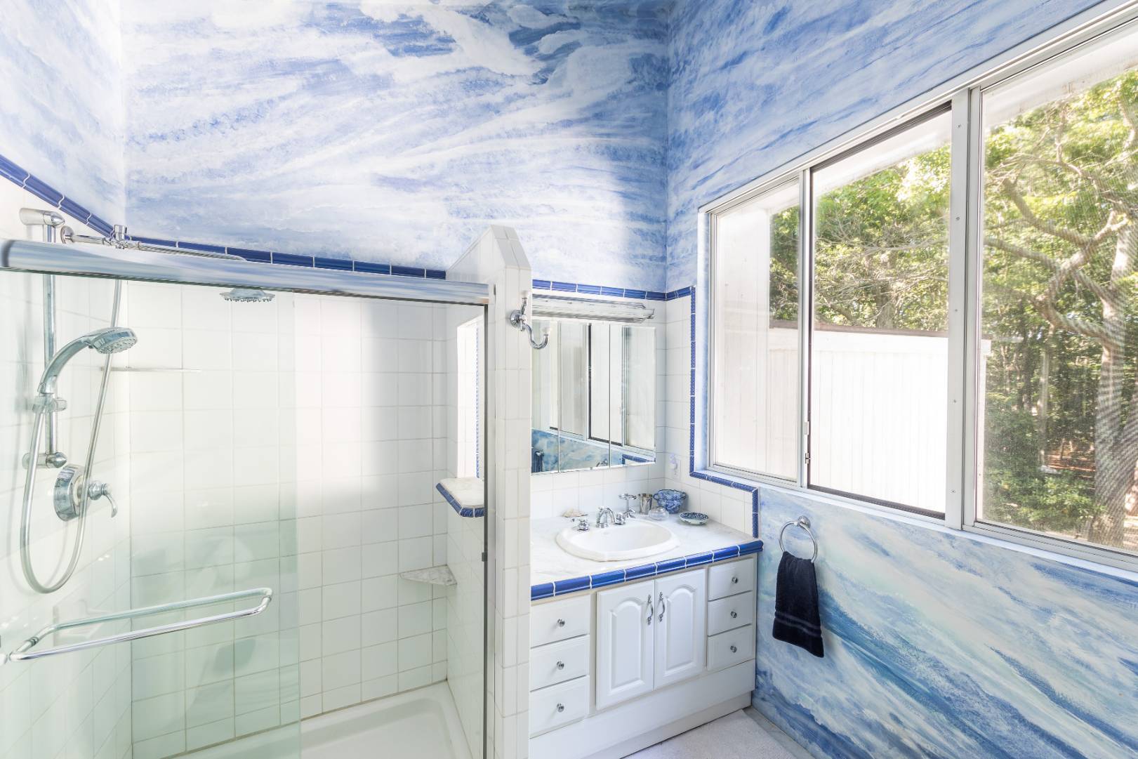 114 Neck Path East Hampton, NY 11937 - Photo 9 of 20 a bathroom with a granite countertop sink a shower and a bathtub