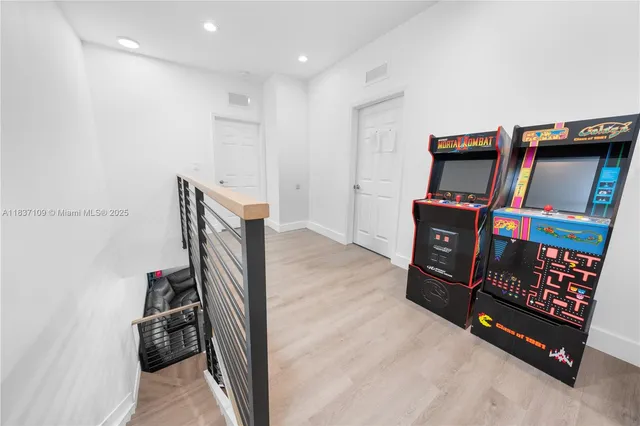 a view of a bedroom with furniture and closet