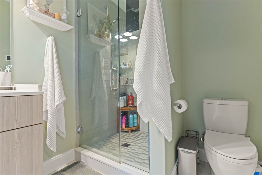 6 Ashland Street, Unit 3 Boston, MA 02122 - Photo 17 of 25 a bathroom with a toilet and a shower