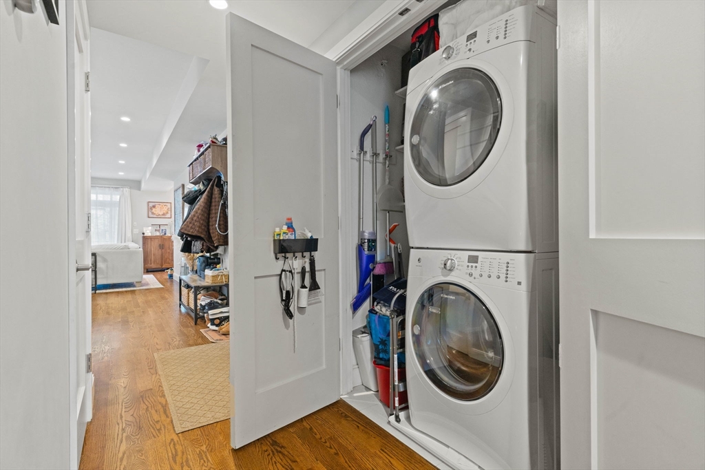 6 Ashland Street, Unit 3 Boston, MA 02122 - Photo 21 of 25 a view of a storage and utility room with washer and dryer