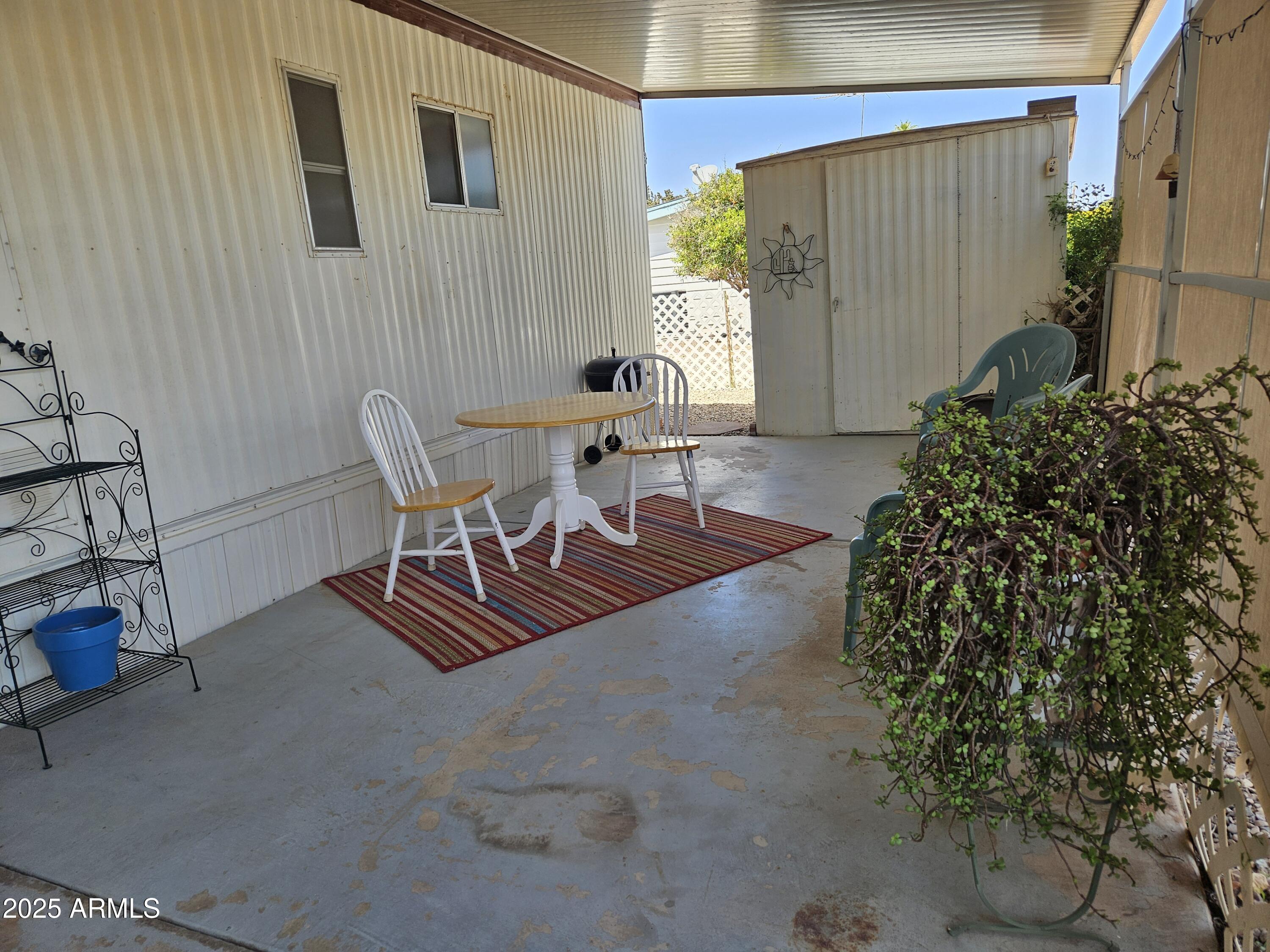 654 East Ranch Road, Unit 53 San Tan Valley, AZ 85140 - Photo 24 of 39 Back of Carport for relaxing