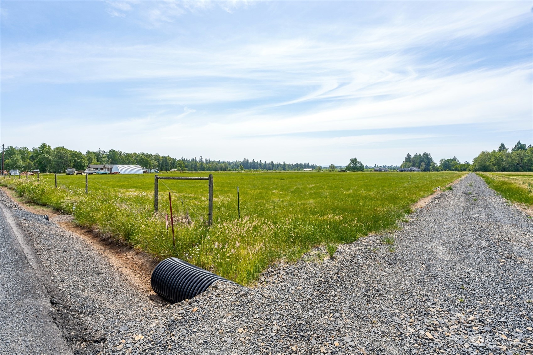 5 Tauscher Road Onalaska, WA 98570 - Photo 4 of 13 a view of a lake with a garden