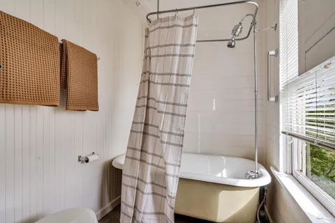 a bathroom with a sink and a shower
