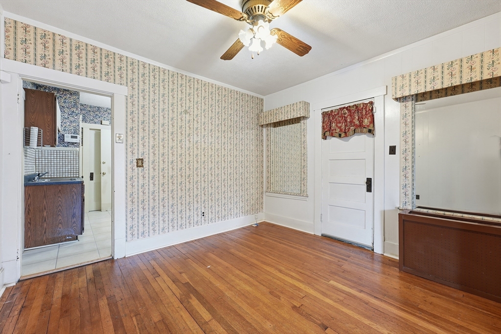 136 Maynard Street Springfield, MA 01109 - Photo 18 of 35 wooden floor in an empty room with a window