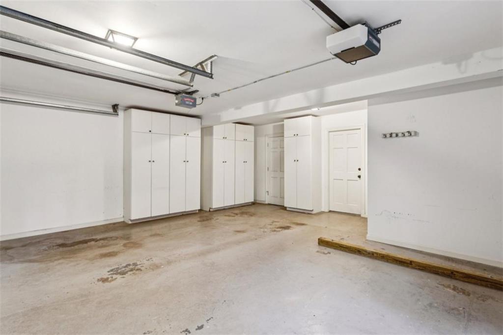 650 Moores Mill Road Northwest, Unit 19 Atlanta, GA 30327 - Photo 42 of 48 a view of an empty room