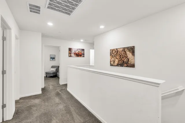 a view of a hallway with closet