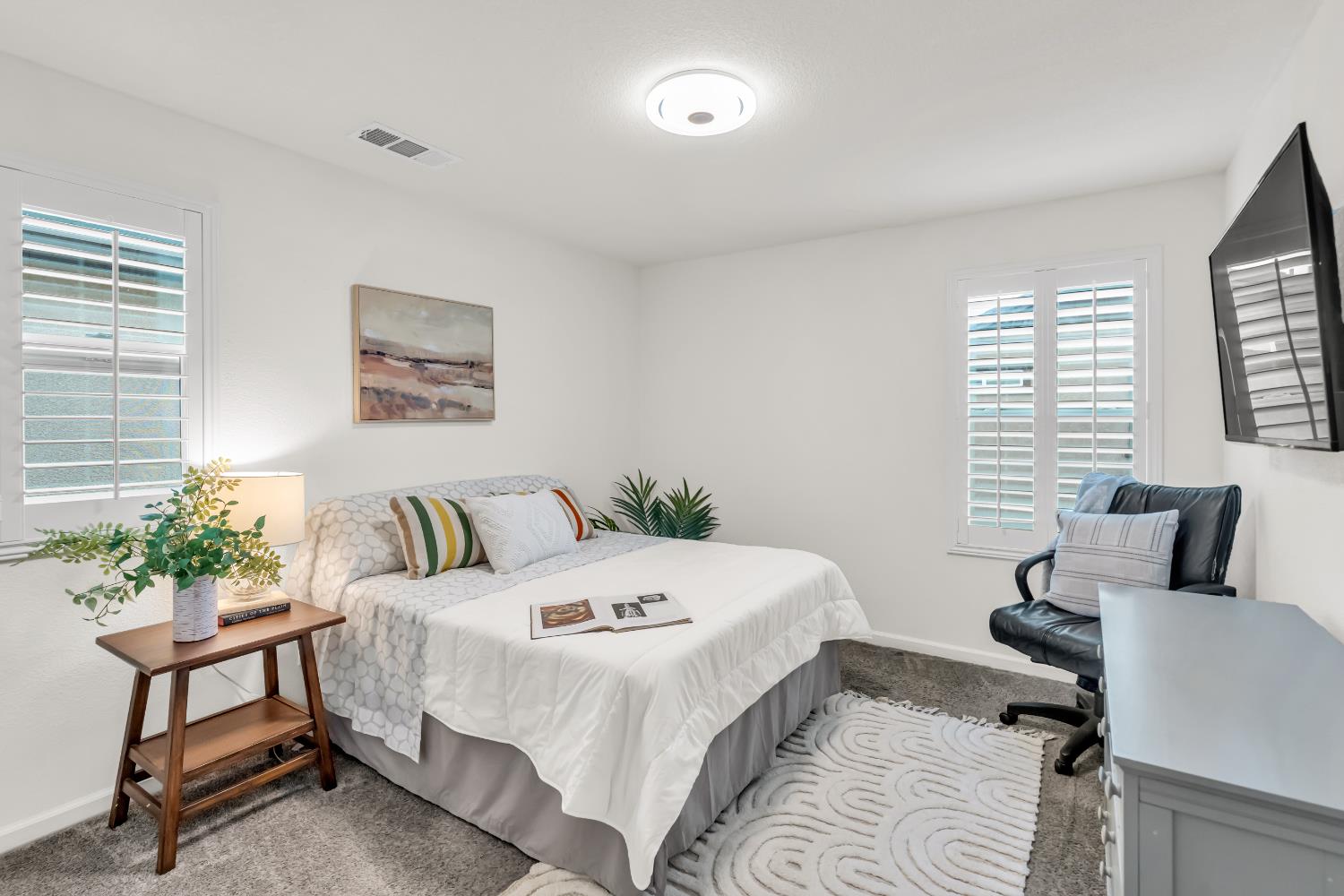 8193 Kramer Ranch Way Elk Grove, CA 95758 - Photo 22 of 48 a bedroom with a bed a table and chair