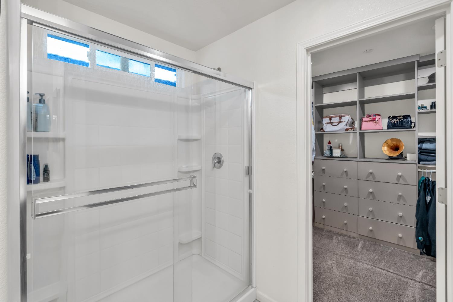 8193 Kramer Ranch Way Elk Grove, CA 95758 - Photo 32 of 48 a bathroom with a shower and a mirror