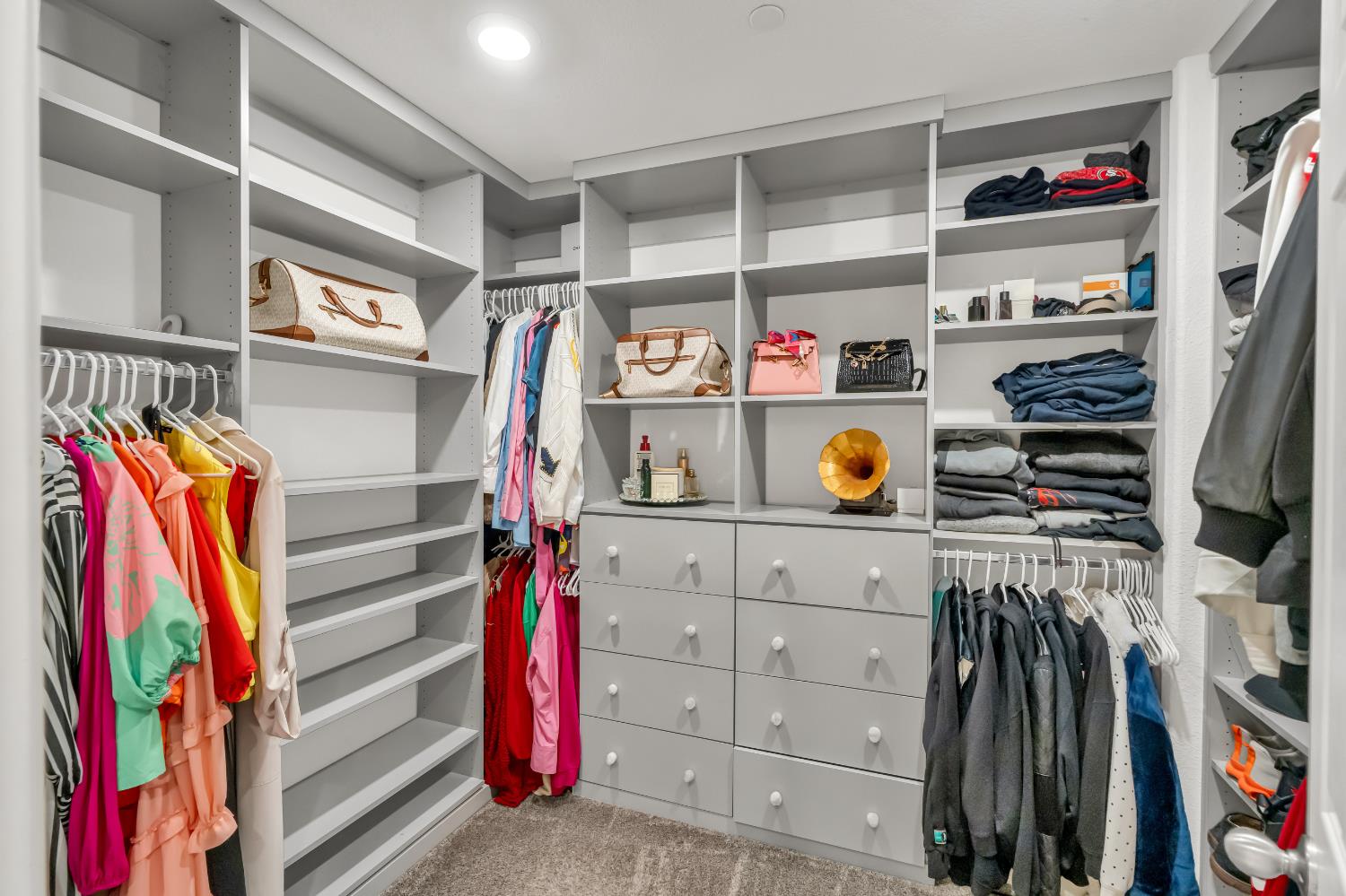 8193 Kramer Ranch Way Elk Grove, CA 95758 - Photo 33 of 48 a view of walk in closet with clothes and shoes