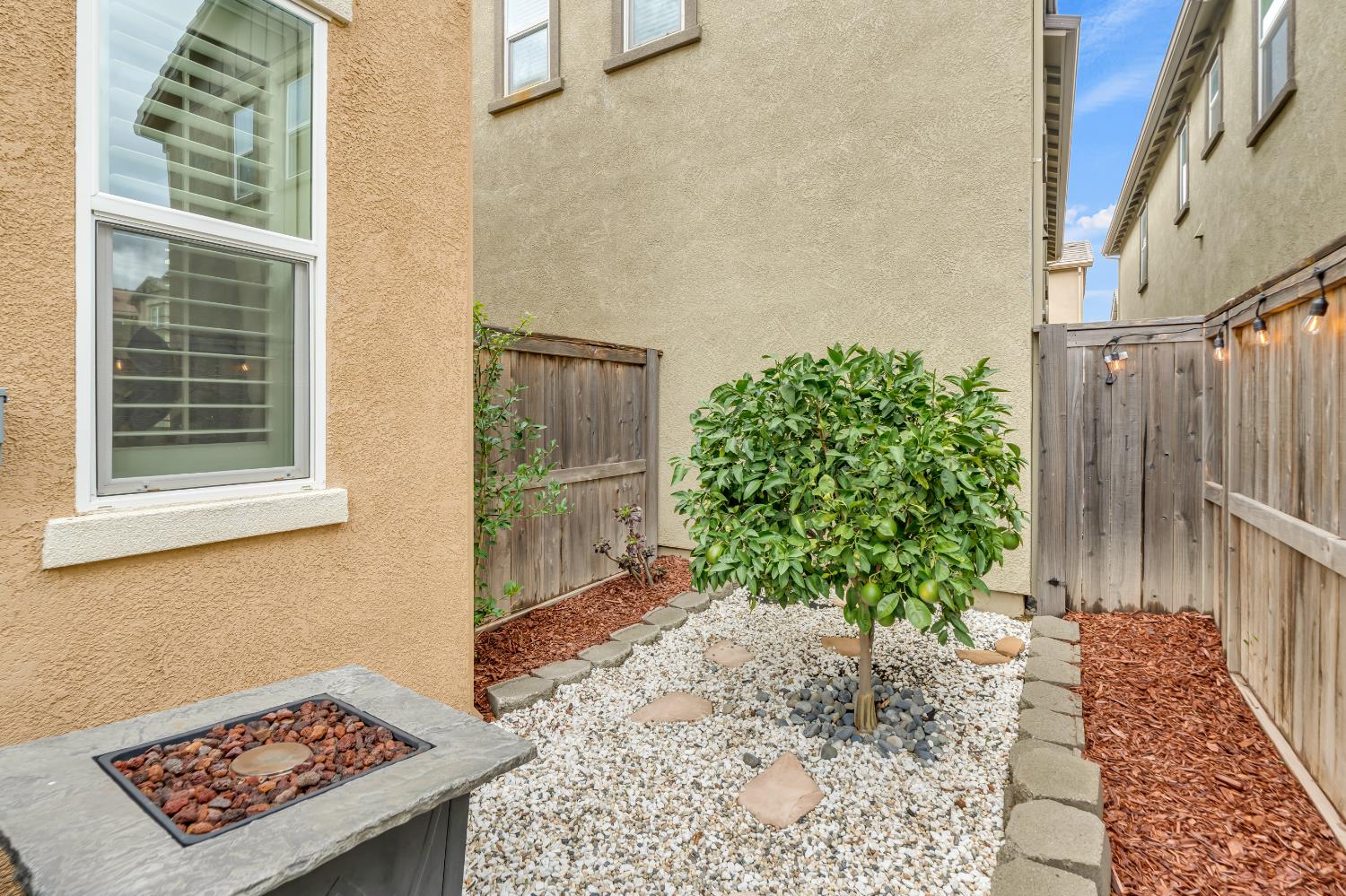 8193 Kramer Ranch Way Elk Grove, CA 95758 - Photo 36 of 48 a view of a wooden door with a bench