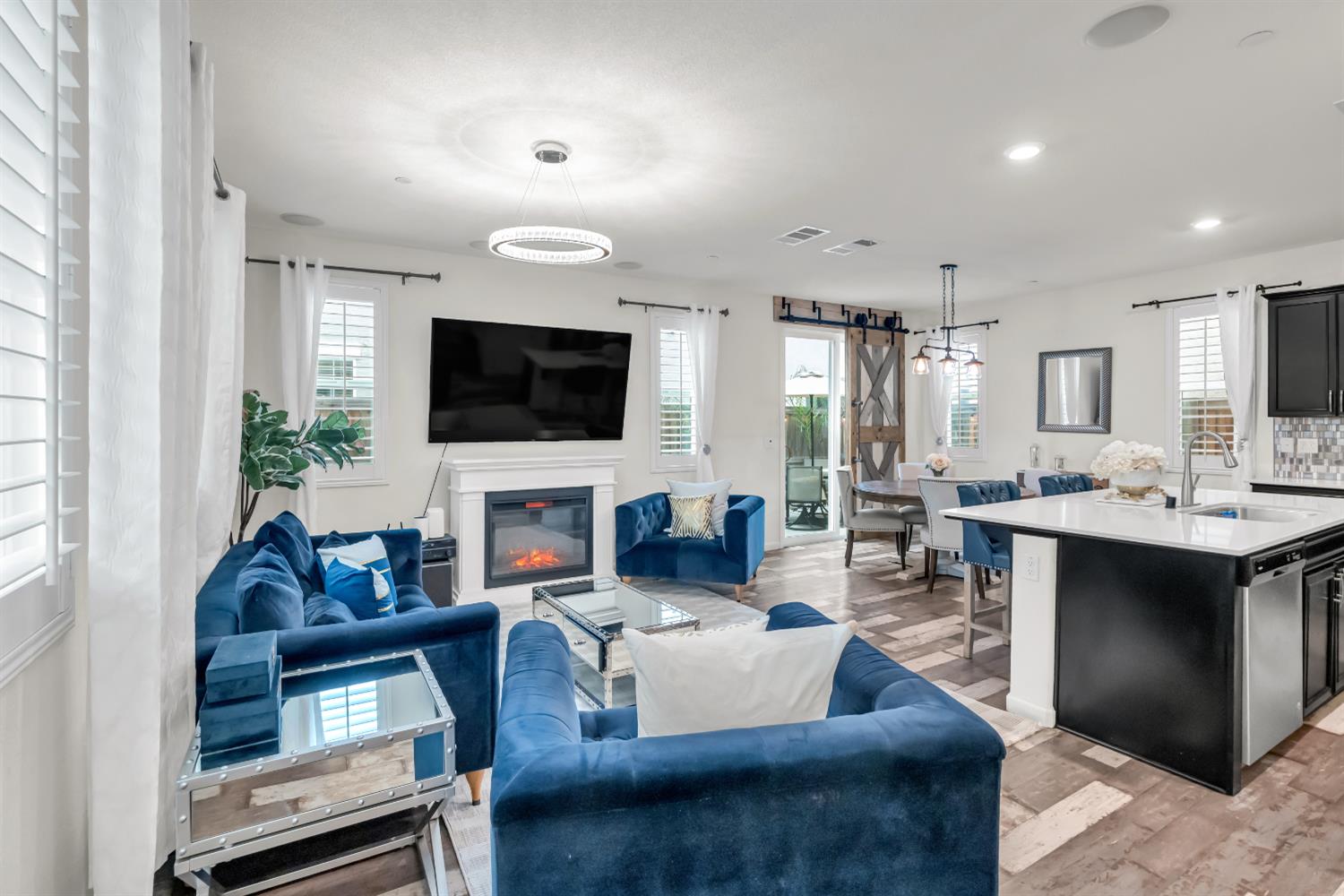 8193 Kramer Ranch Way Elk Grove, CA 95758 - Photo 6 of 48 a living room with fireplace furniture and a flat screen tv