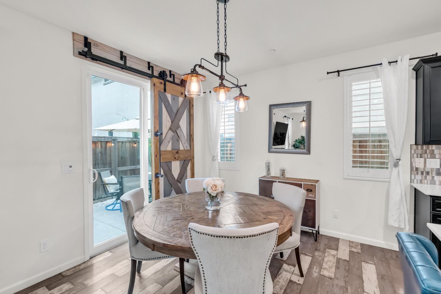 8193 Kramer Ranch Way Elk Grove, CA 95758 - Photo 8 of 48 a dining room with furniture and window