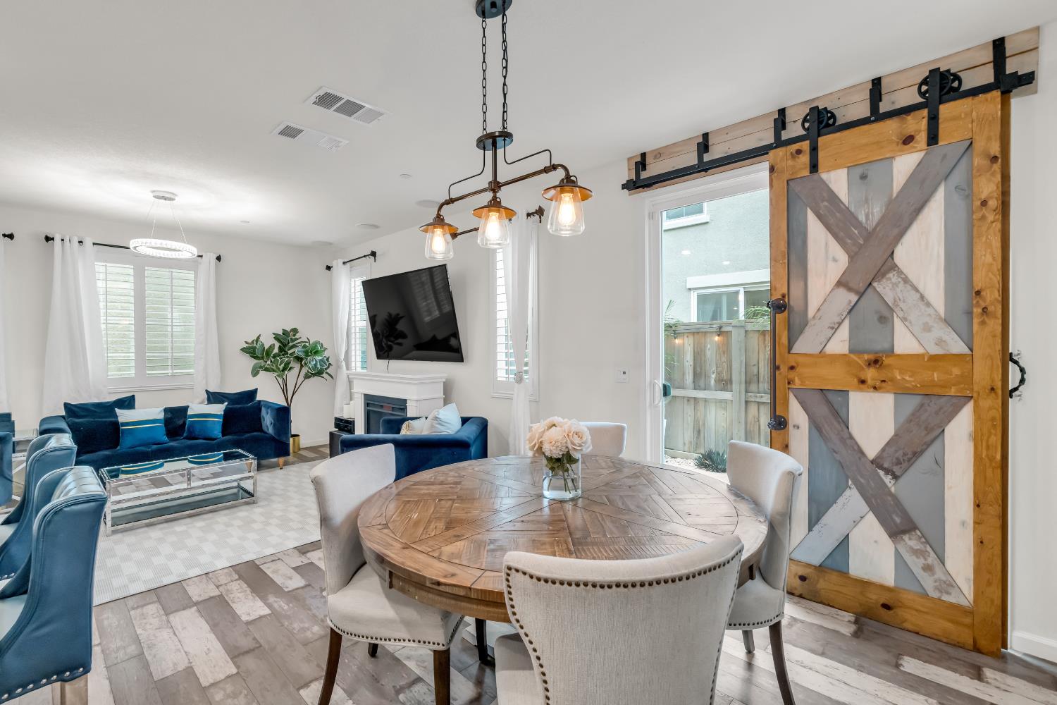 8193 Kramer Ranch Way Elk Grove, CA 95758 - Photo 9 of 48 a living room with furniture a flat screen tv and a window