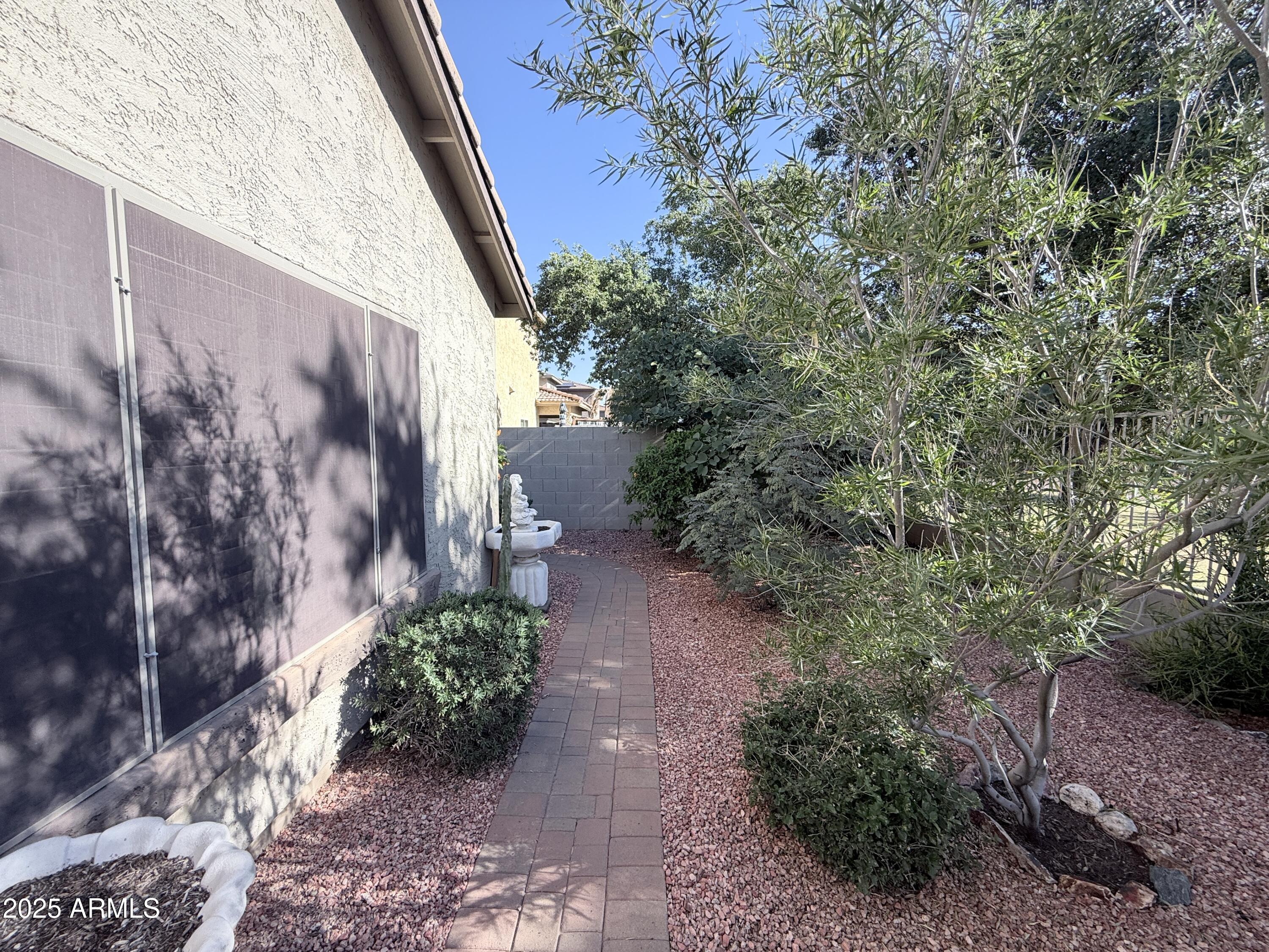 16549 West Rowel Road Surprise, AZ 85387 - Photo 22 of 23 a view of a pathway of a building