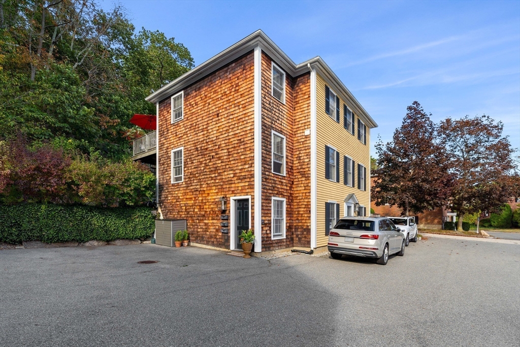 28 Elm Street, Unit 3 Manchester, MA 01944 - Photo 15 of 20 a view of street and car parked on road