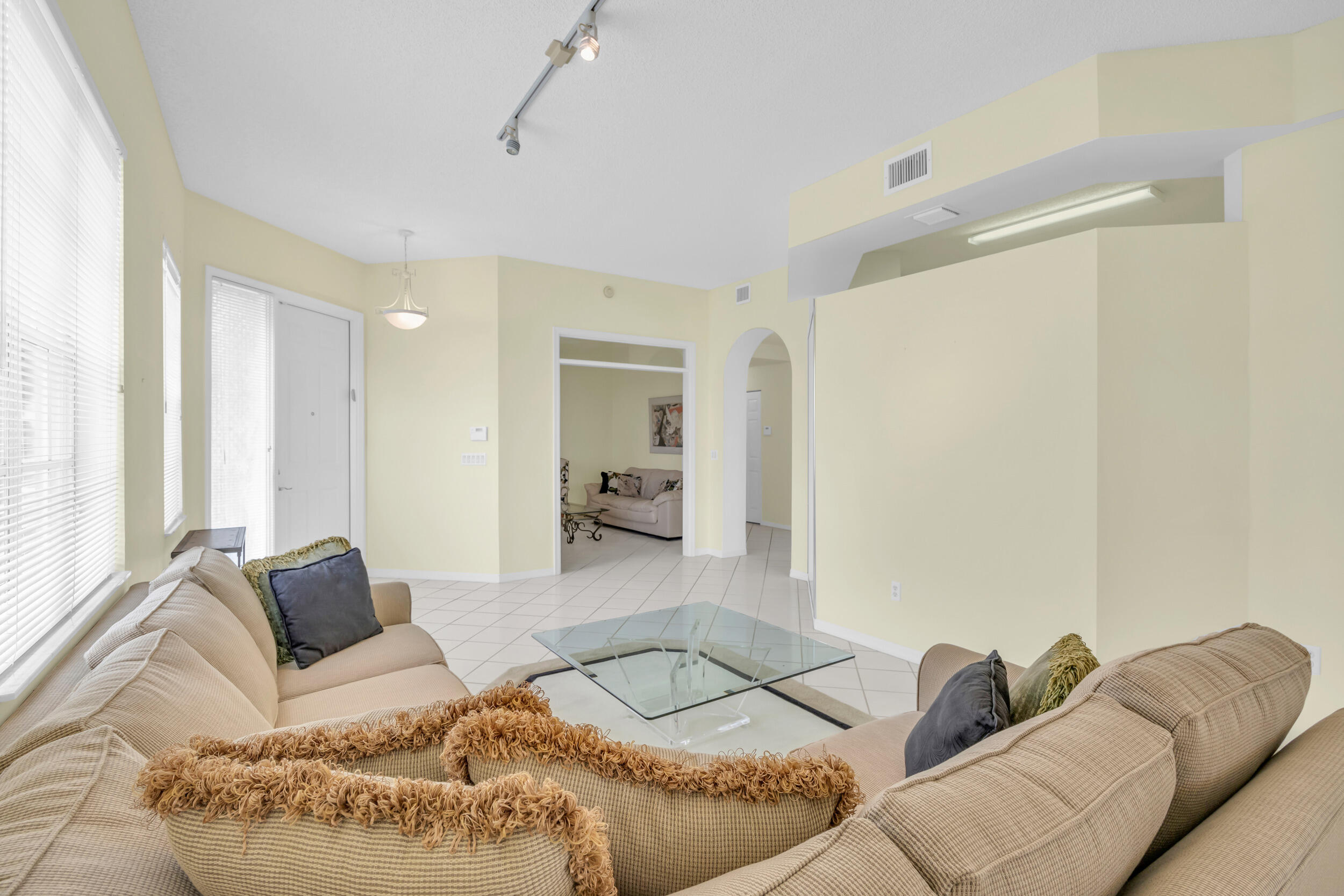 10172 Andover Coach Circle, Unit G2 Lake Worth, FL 33449 - Photo 11 of 64 a living room with furniture and a couch