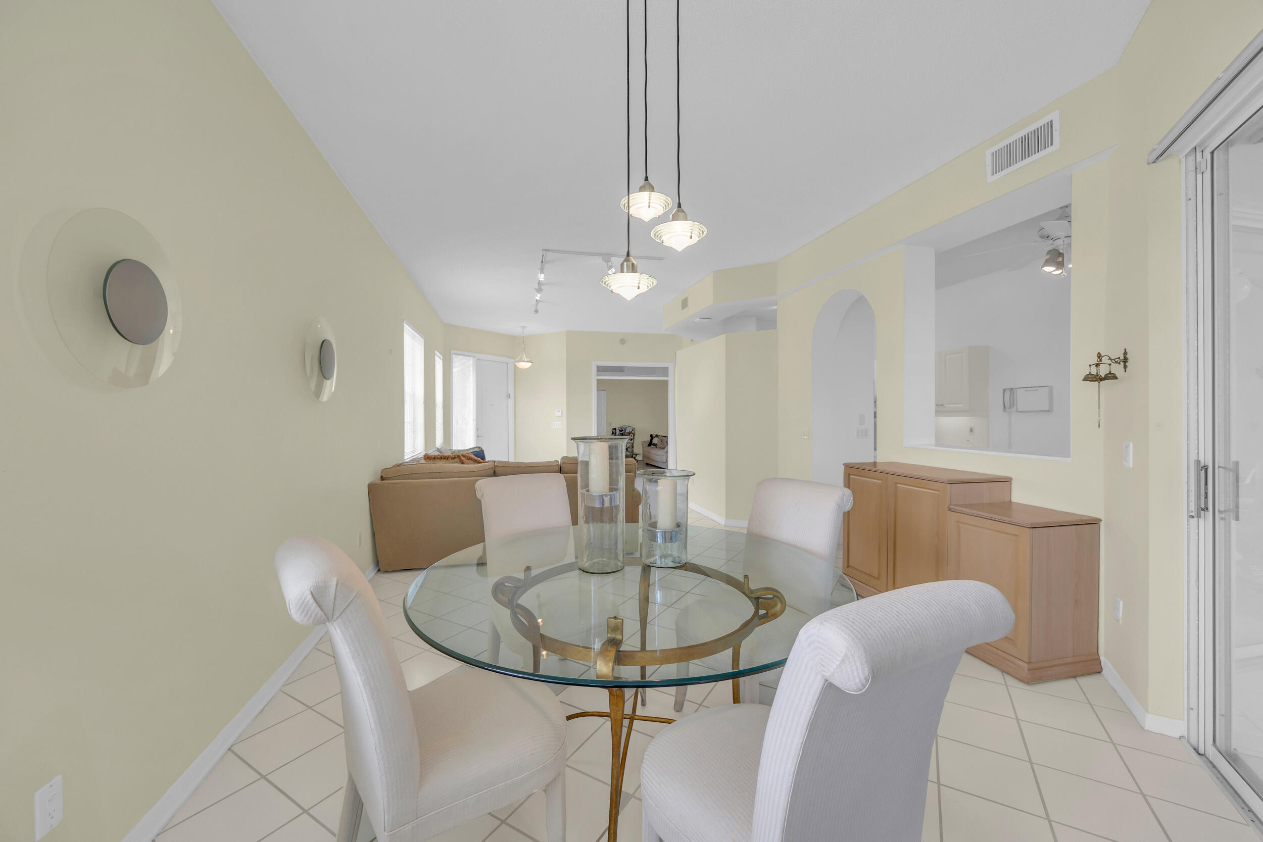 10172 Andover Coach Circle, Unit G2 Lake Worth, FL 33449 - Photo 14 of 64 a dining room with furniture and window