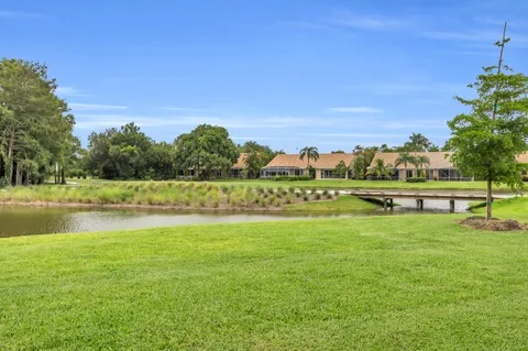 an aerial view of a houses and an outdoor space