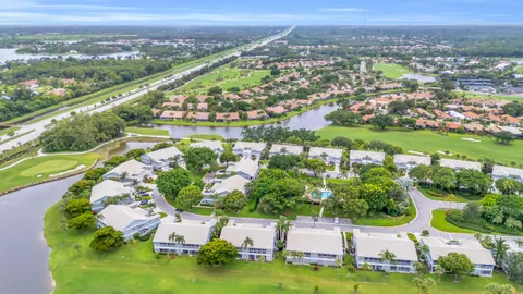 a view of a house with a yard porch and sitting area