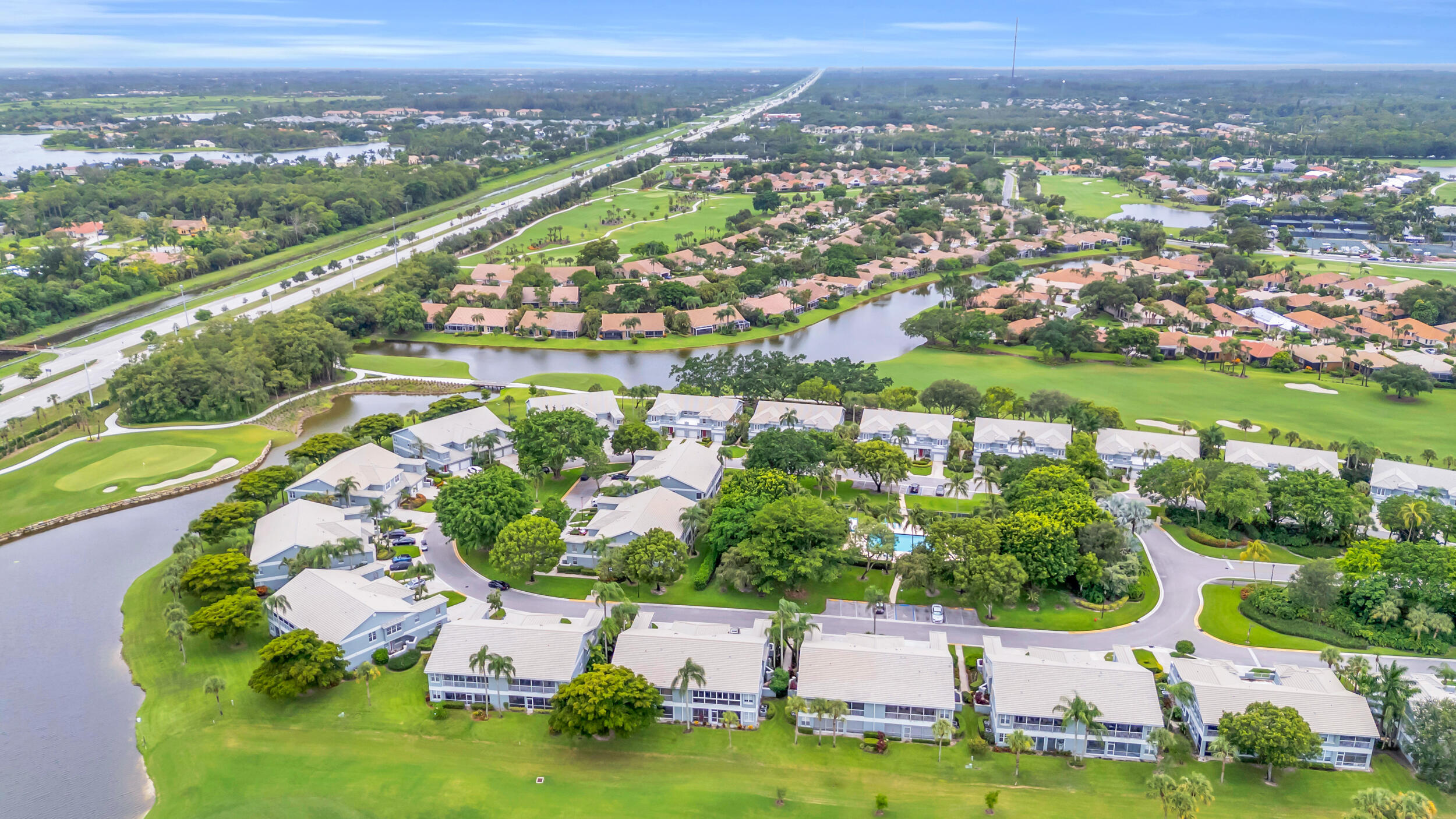 10172 Andover Coach Circle, Unit G2 Lake Worth, FL 33449 - Photo 41 of 64 an aerial view of a house with a garden