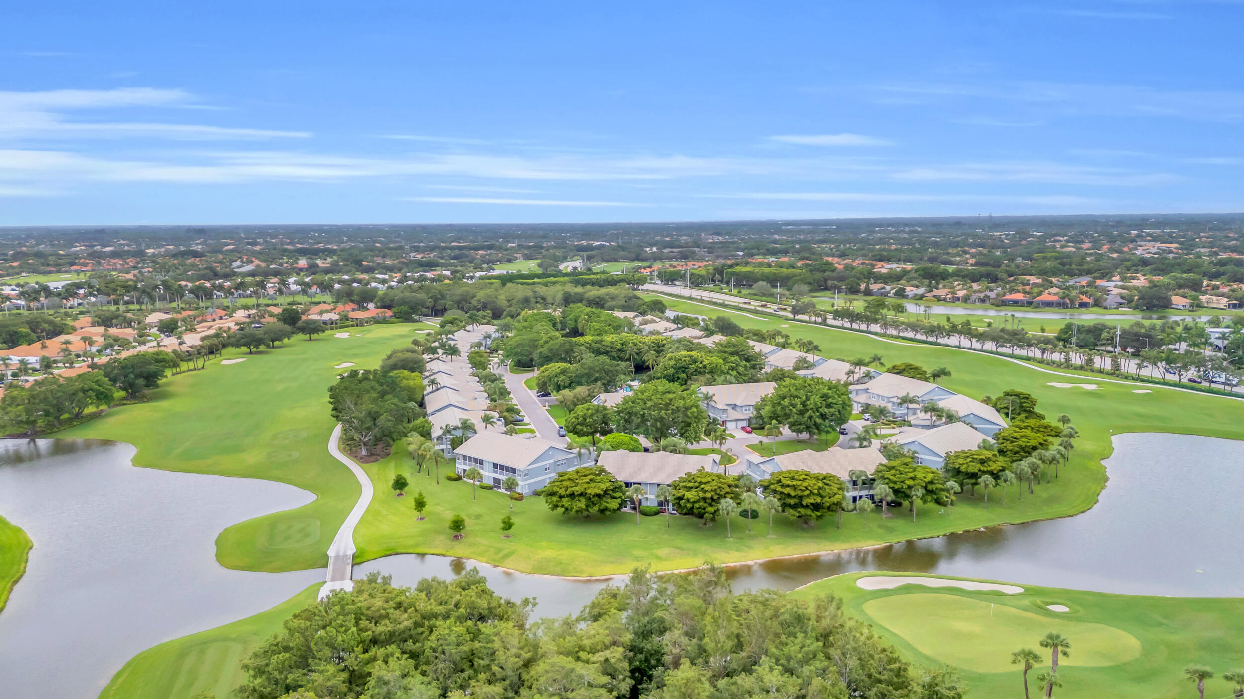 10172 Andover Coach Circle, Unit G2 Lake Worth, FL 33449 - Photo 44 of 64 an aerial view of residential houses with outdoor space