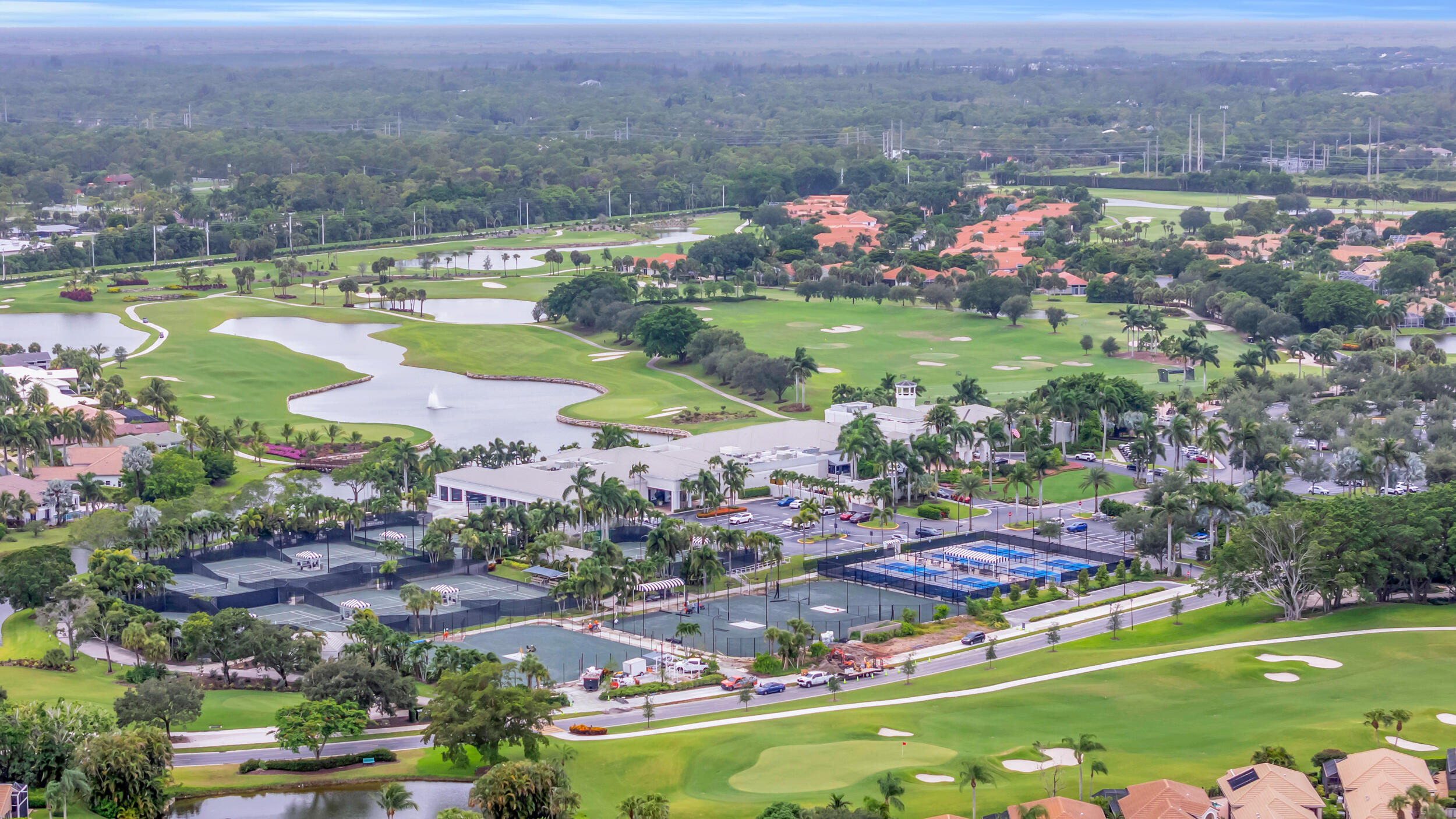 10172 Andover Coach Circle, Unit G2 Lake Worth, FL 33449 - Photo 45 of 64 an aerial view of a houses and an outdoor space