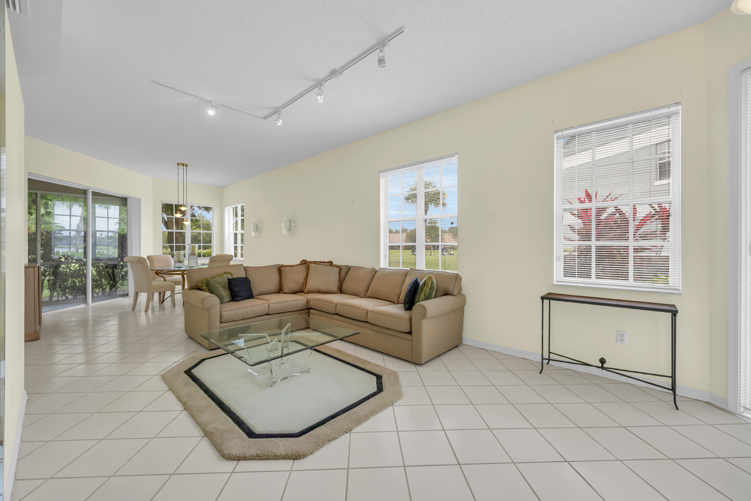 10172 Andover Coach Circle, Unit G2 Lake Worth, FL 33449 - Photo 8 of 64 a living room with furniture and a window